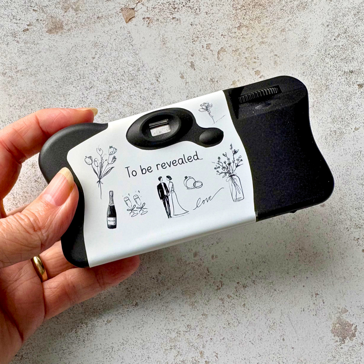 Back of personalised black and white wedding camera wrap with line art