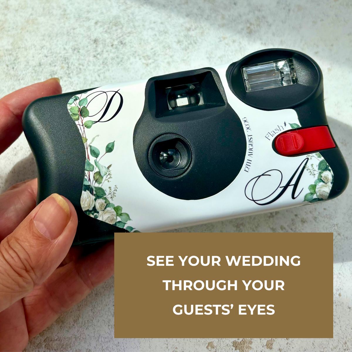 Eucalyptus floral wedding camera wrap shown in hand