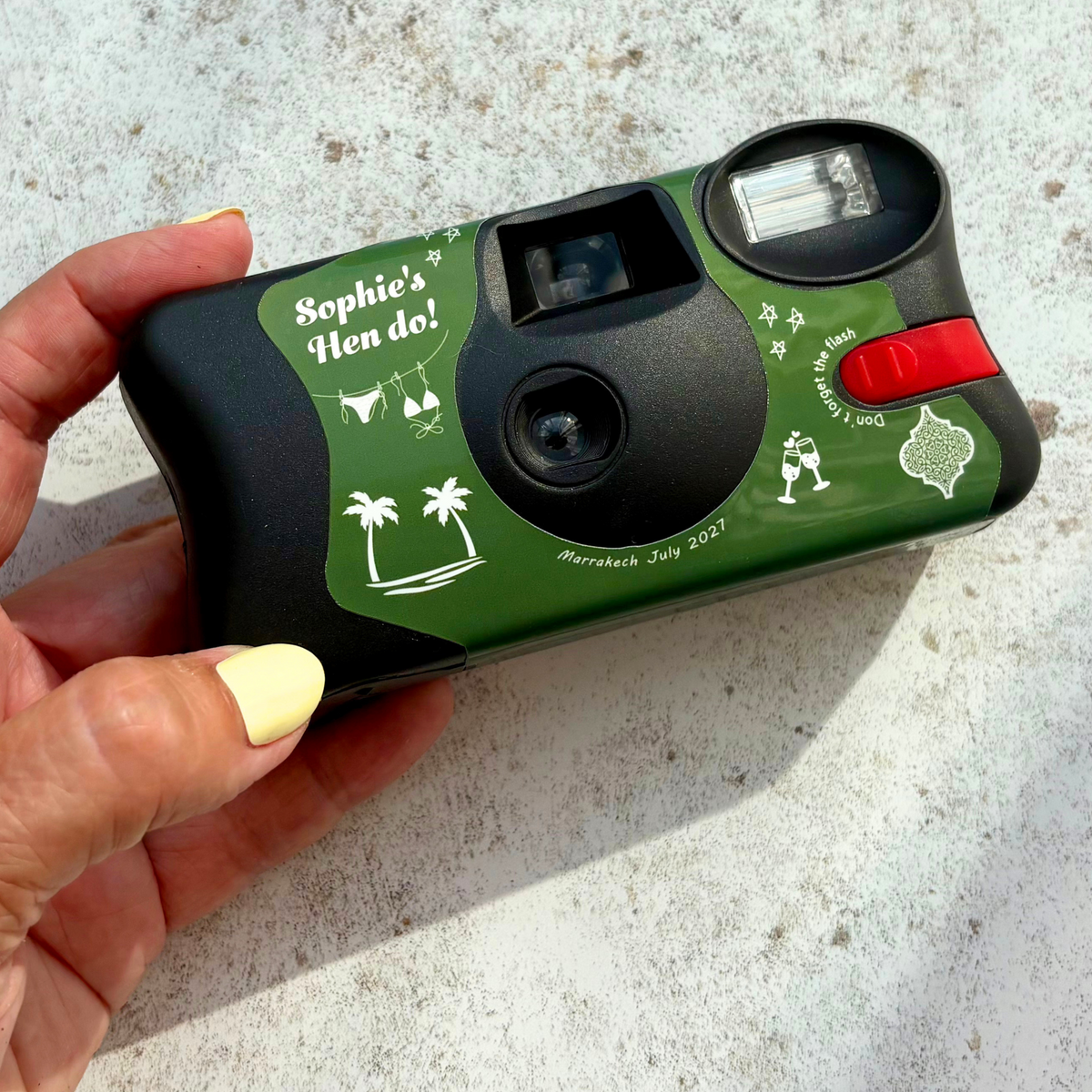 Personalised Marrakech hen party Kodak FunSaver camera front held in hand