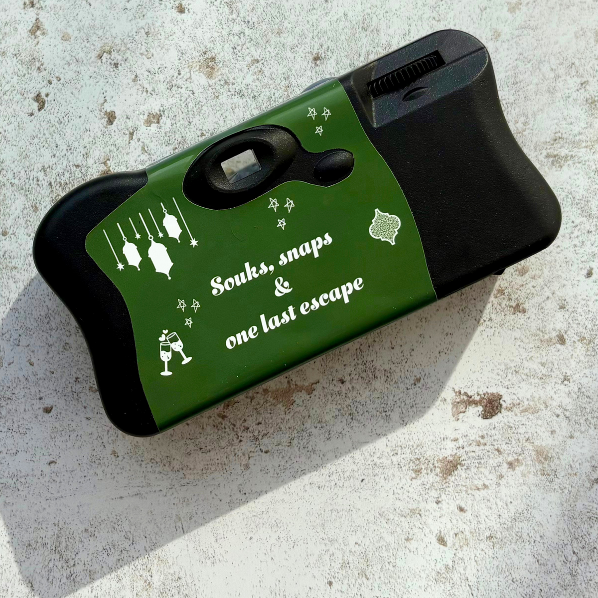 Back of personalised Marrakech camera with Souks snaps and one last escape design