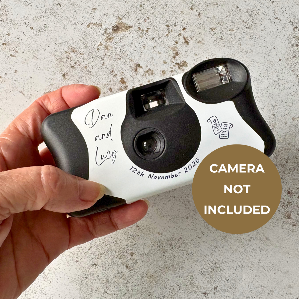 Product information confirming that the Kodak FunSaver camera is not included with the personalised wedding camera wrap